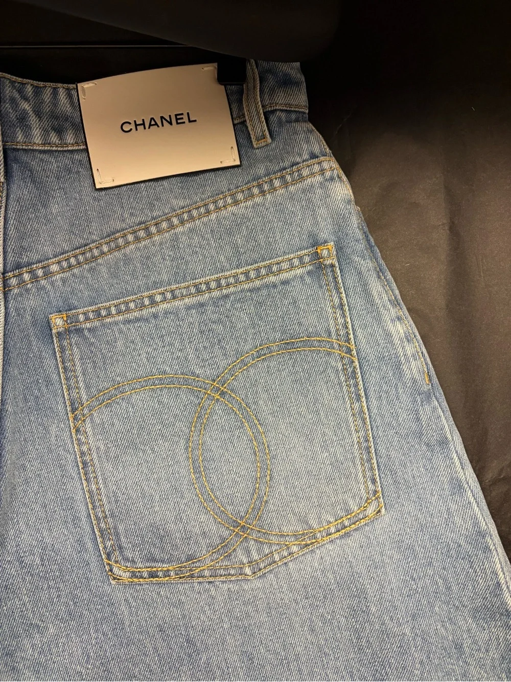 CHANEL Light Blue Straight-Leg Denim Jeans with Signature Back Pocket Stitching